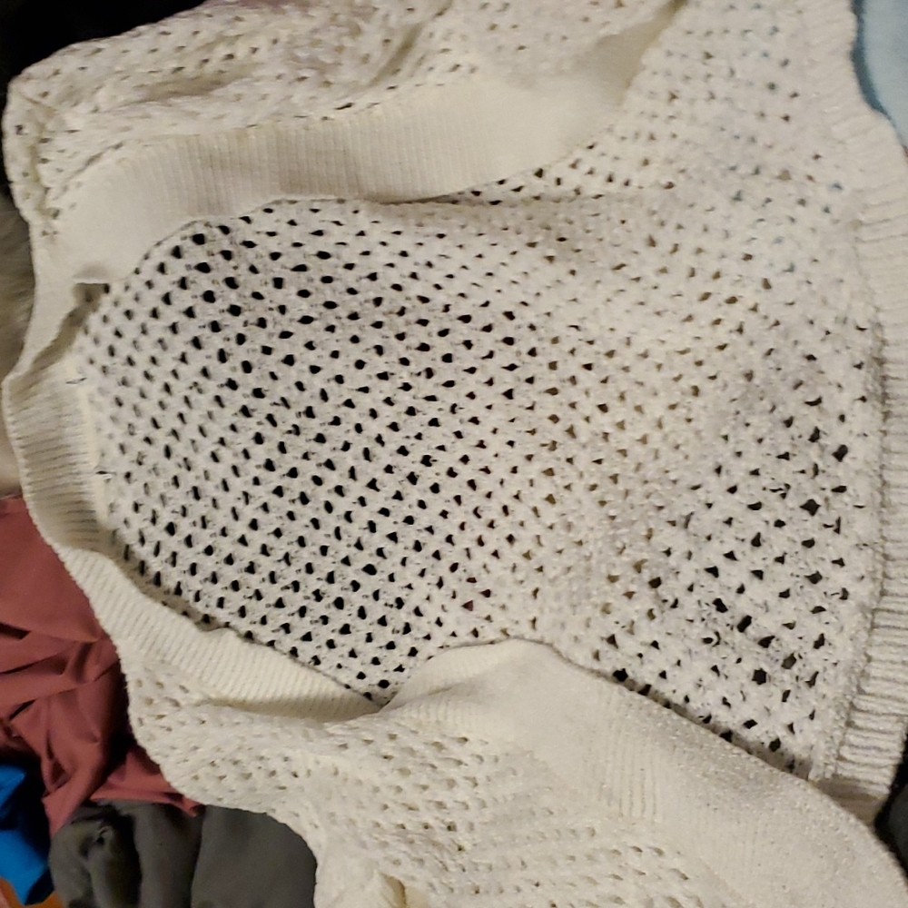 New without tag pretty cover up sweater with holes pattern